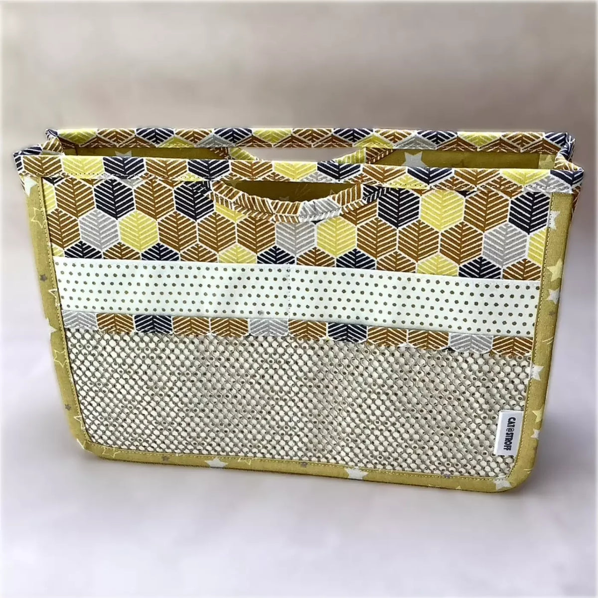 Organiseur de sac jaune mosaïque CATASTROFF avec motifs géométriques et poche filet.