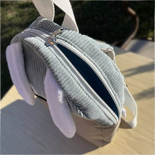 Sac à dos enfant Lapinou Douillet de CATASTROFF en velours côtelé bleu clair avec oreilles de lapin